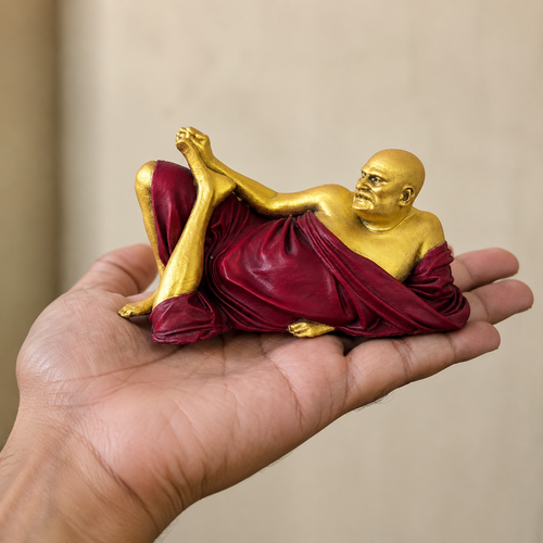 Neem Karoli Baba miniature statue held in a hand